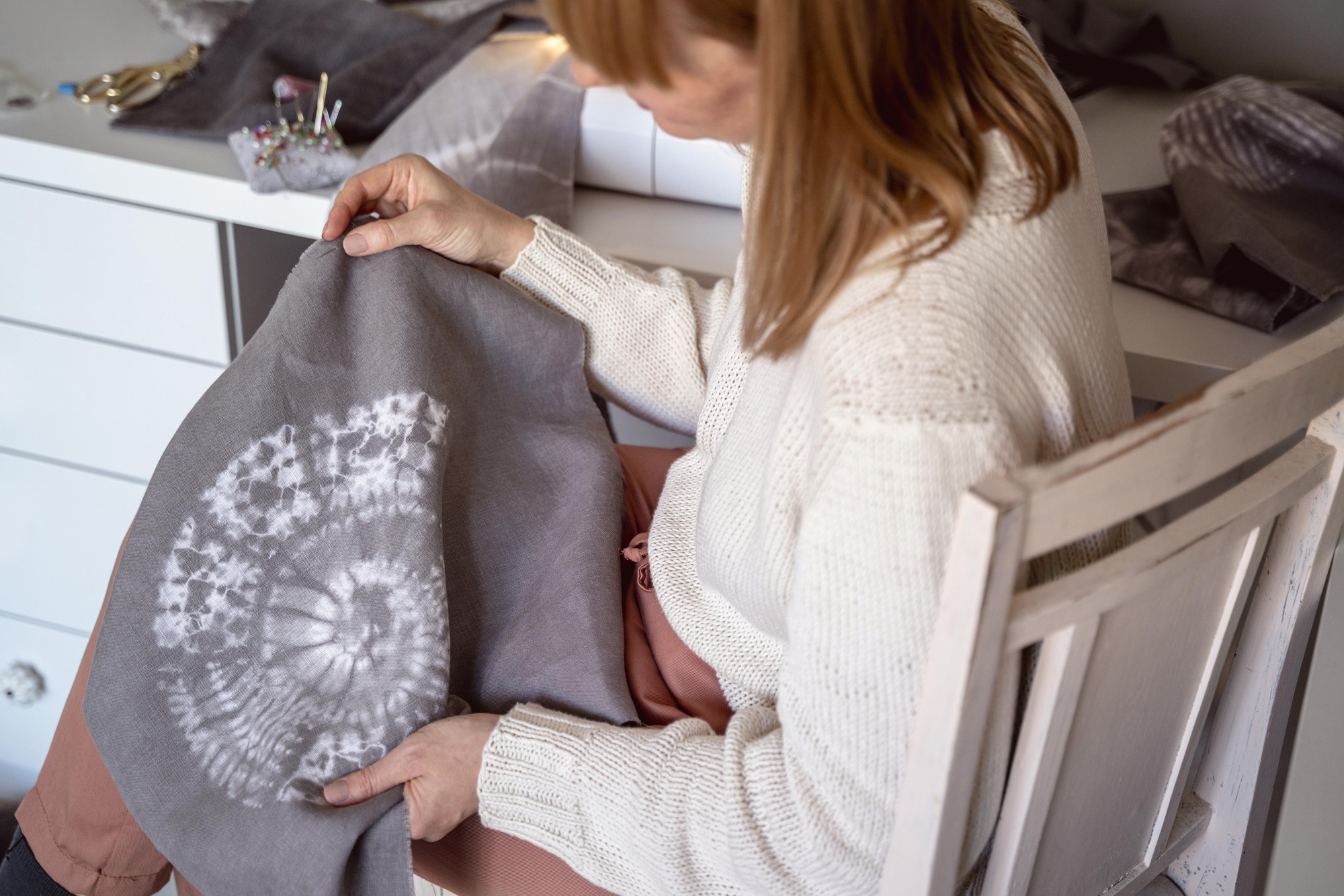embroidered linen pillow in soft colors